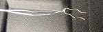 BRA retaining clip with string.jpg